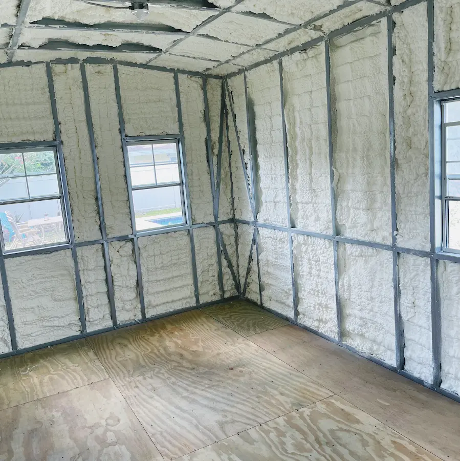 Closed-cell spray foam insulation applied to wall cavities in a residential project in Chico